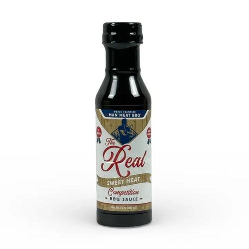 Man Meat BBQ Kansas City sweet heat BBQ sauce bottle showcasing rich flavors and a bold design.