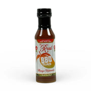 Man Meat BBQ Mango Habanero barbecue glaze bottle showcasing sweet and spicy flavor for grilled dishes.