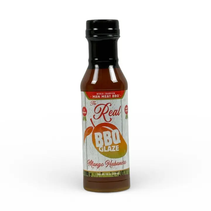 Man Meat BBQ Mango Habanero barbecue glaze bottle showcasing sweet and spicy flavor for grilled dishes.