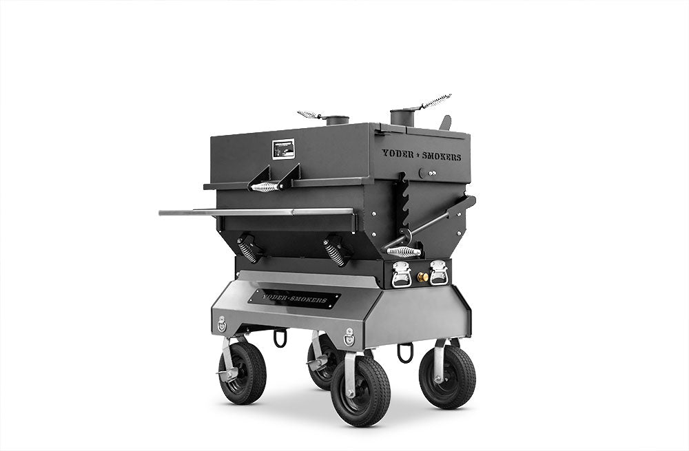 Yoder Smokers Flat Top competition charcoal grill on a wheeled cart, designed for precise outdoor cooking.