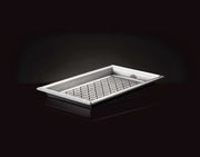 Napoleon stainless steel grilling topper for perfectly searing vegetables and seafood.