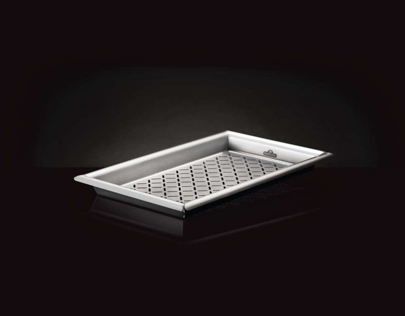 Napoleon stainless steel grilling topper for perfectly searing vegetables and seafood.