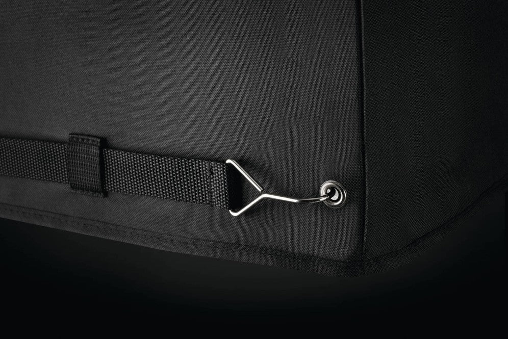 Close-up of the durable strap and fastening on the Napoleon 700 series grill cover.