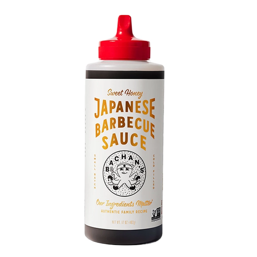 Bottle of Japanese barbecue sauce with a red cap on a white background