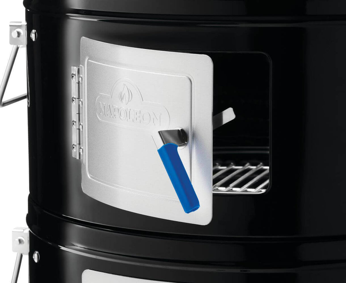 Close-up of the Napoleon Grills Apollo 18 charcoal water smoker door with insulated handle.