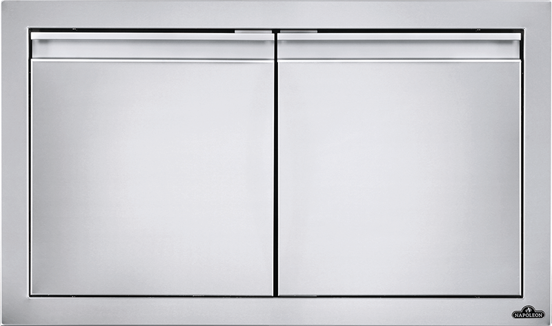 Napoleon small double door grill storage with stainless steel construction and sleek design for outdoor kitchen.