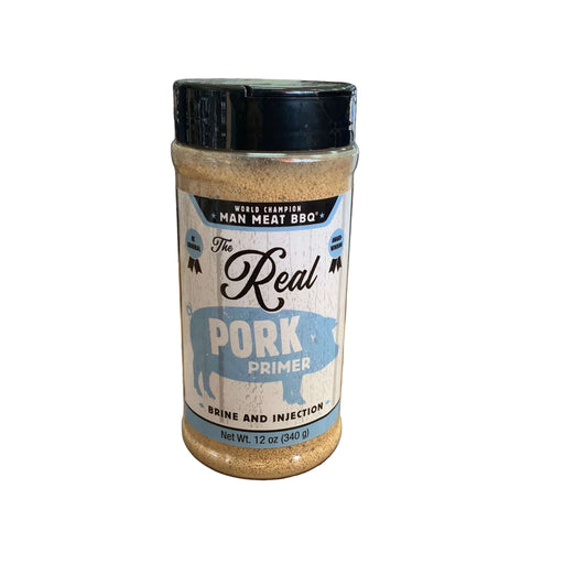 Man Meat BBQ The Real Pork Primer bottle showcasing pork injection marinade for flavorful barbecue cooking.