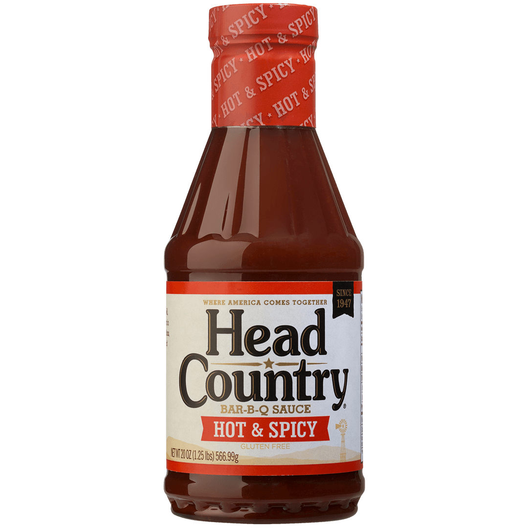 Head Country hot and spicy BBQ sauce bottle with bold flavors for marinating or dipping in backyard cooking.