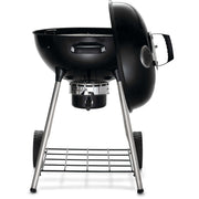 Napoleon Grills Premium 22 inch charcoal kettle grill side view with adjustable air vents and stand.