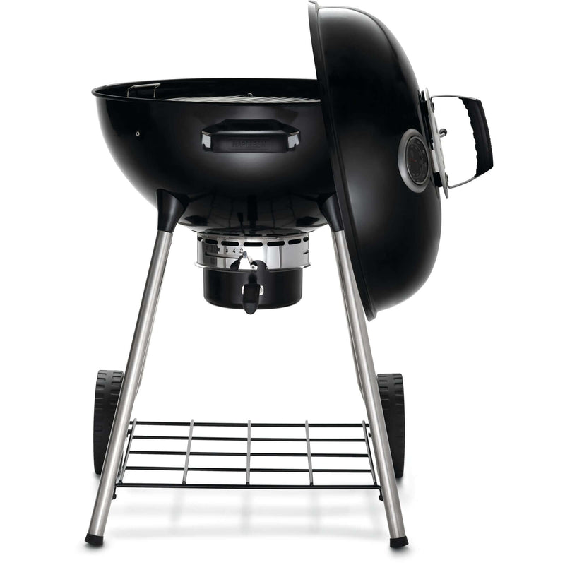 Napoleon Grills Premium 22 inch charcoal kettle grill side view with adjustable air vents and stand.