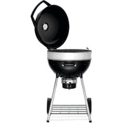 Napoleon charcoal kettle grill with open lid and cooking grate, perfect for outdoor grilling and barbecues.