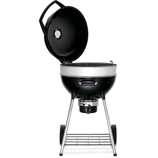 Napoleon charcoal kettle grill with open lid and cooking grate, perfect for outdoor grilling and barbecues.
