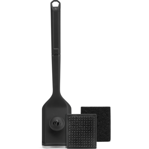 Black spatula and cleaning tools on a white background