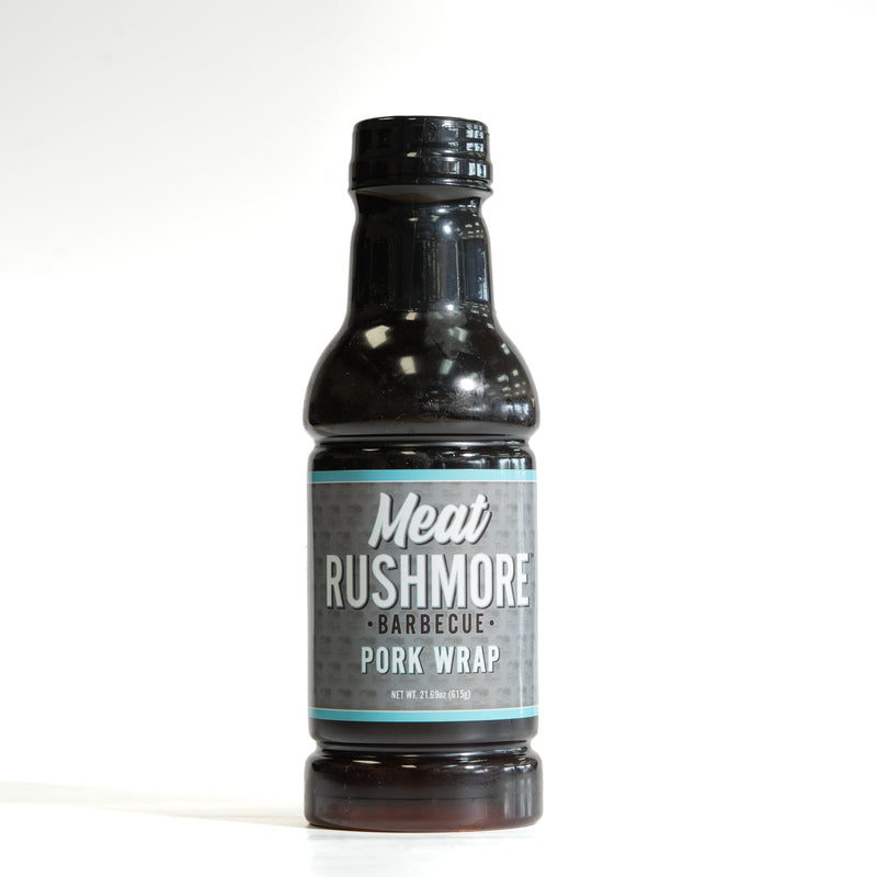 Bottle of Meat Rushmore BBQ Pork Wrap, an award winning BBQ pork wrap perfect for enhancing dishes.