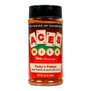 Aces Wild Porky's Palace Rub bottle featuring sweet paprika and garlic, a must-have pork seasoning rub for grilling.