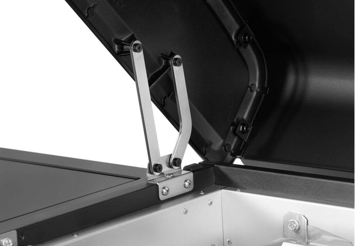 Close-up of the hinge mechanism on a Napoleon gas griddle showcasing durability and design.