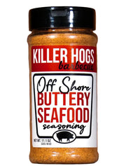 Jar of Killer Hogs Barbecue Off Shore Buttery Seafood seasoning on a wooden background