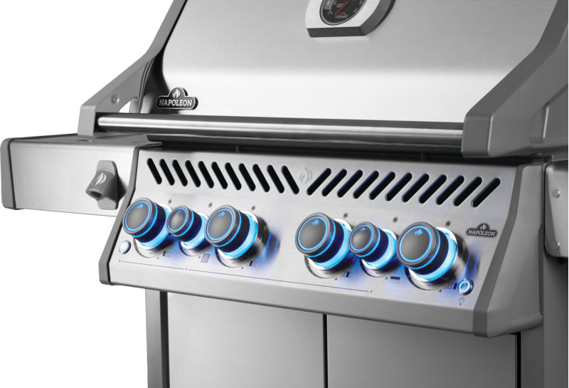 Premium propane gas grill control panel with illuminated knobs for precise temperature settings.