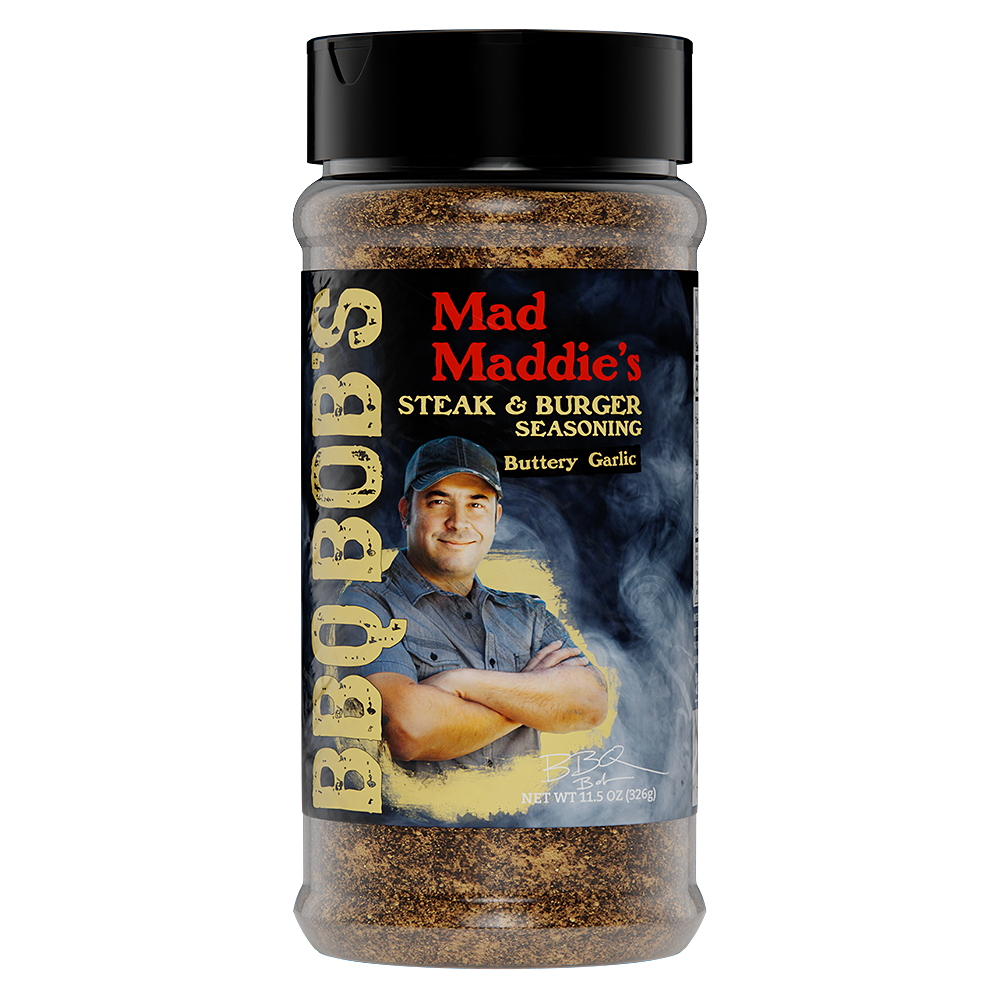 Bobby T's Mad Maddie’s STEAK & BURGER SEASONING blend for flavor-packed steak and burgers, featuring buttery garlic.