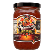 Mommas hot honey drizzle jar showcasing its sweet and spicy blend with natural ingredients and vibrant label.