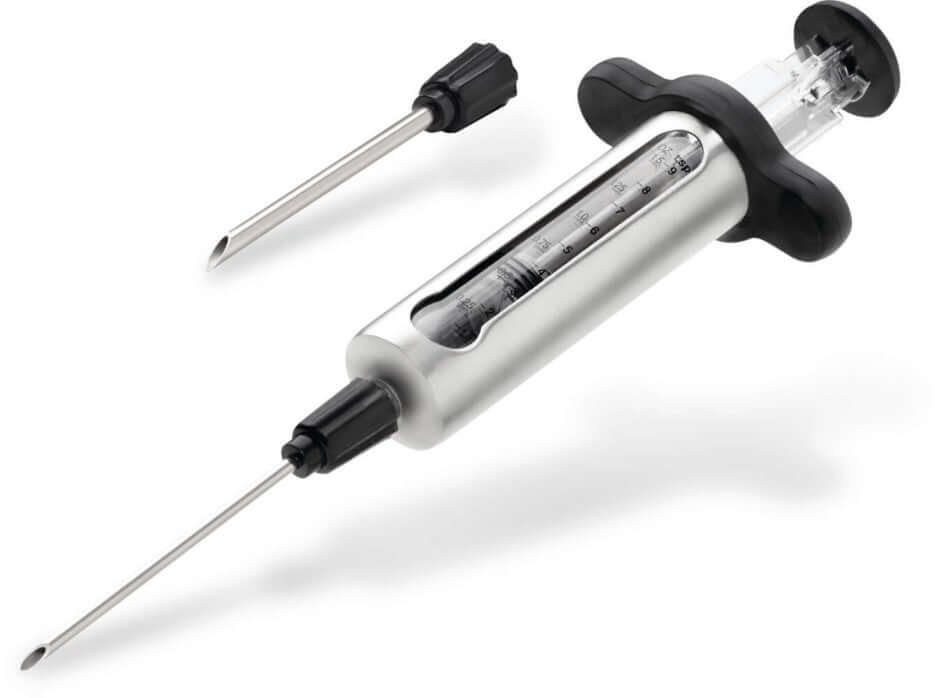 Napoleon stainless steel marinade injector with two interchangeable needles for flavoring meats and preventing dryness.